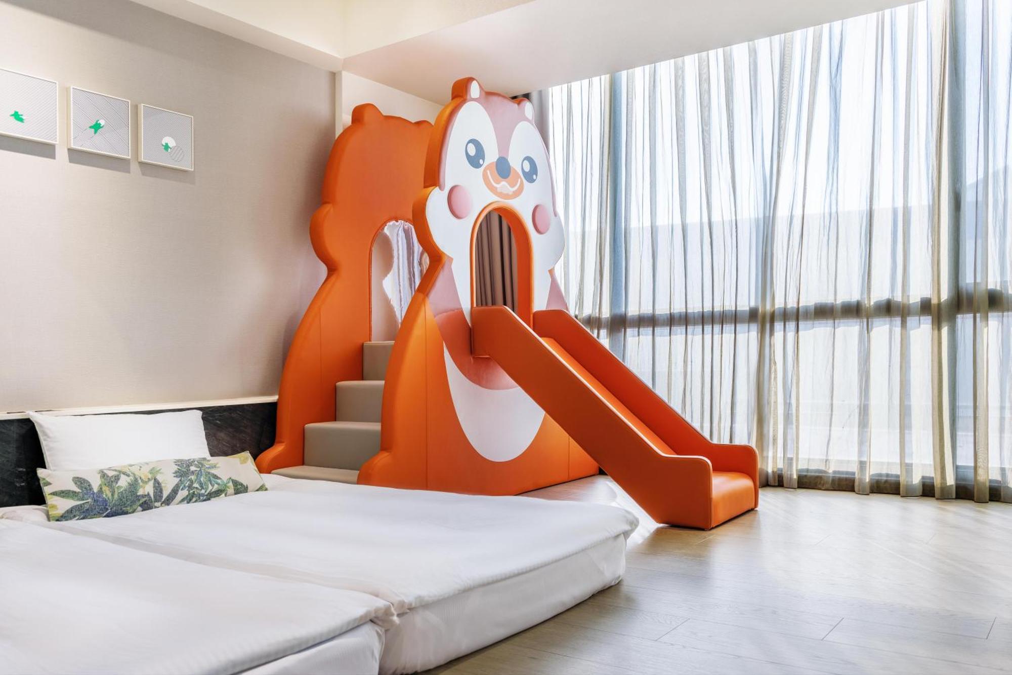 Hsin Hotel 嘉義市 エクステリア 写真 Family room with slide